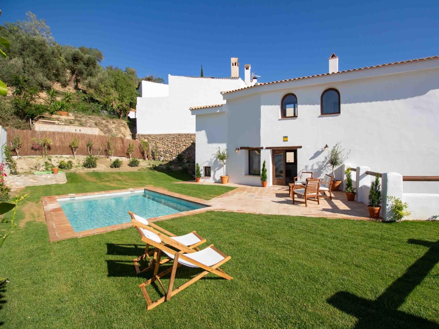 Magnificent rustic house with pool, garden, and views in Acequias
