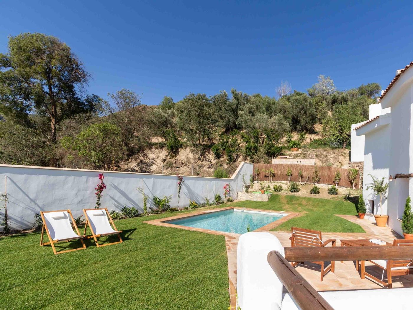 Magnificent rustic house with pool, garden, and views in Acequias