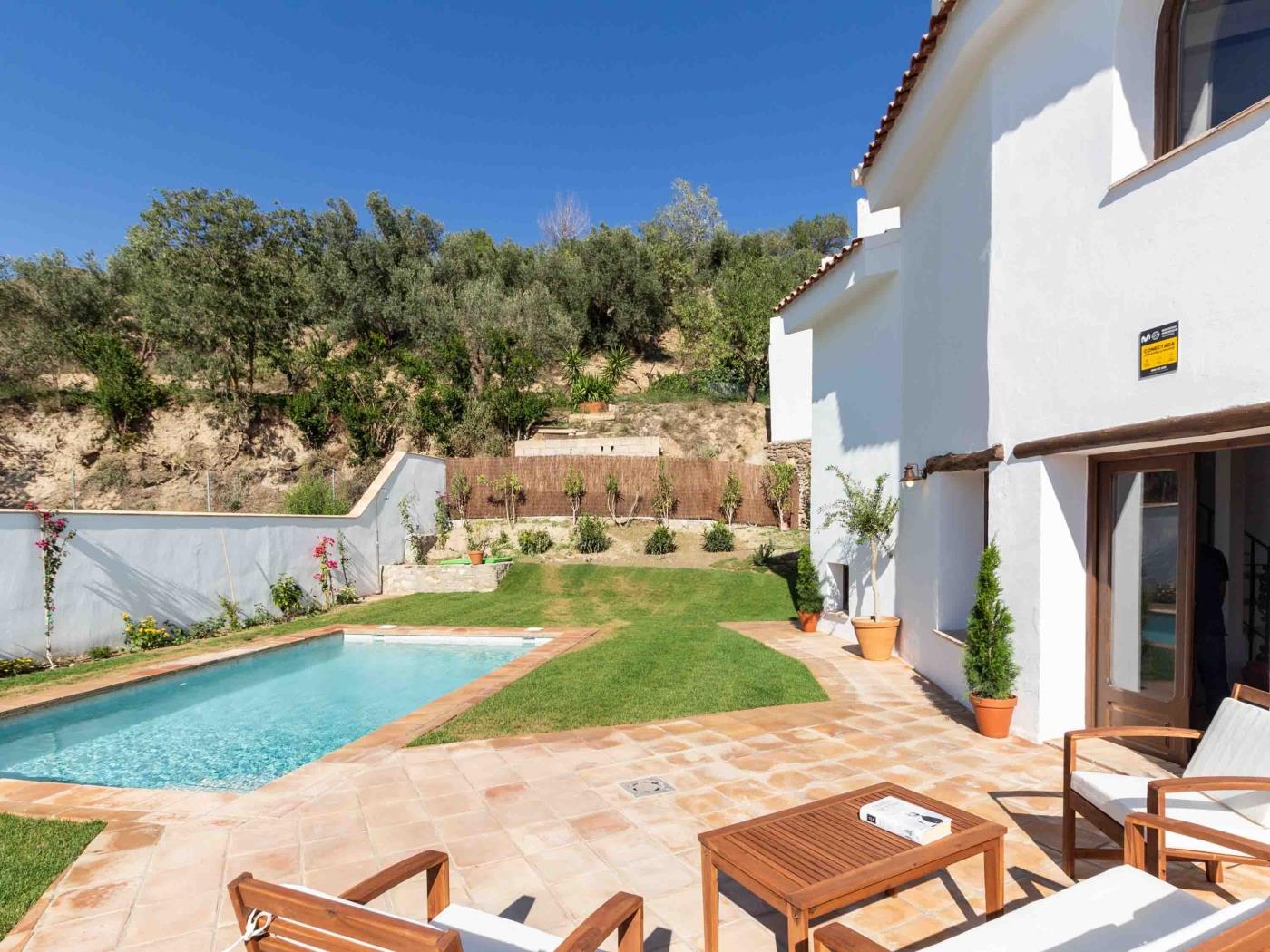 Magnificent rustic house with pool, garden, and views in Acequias