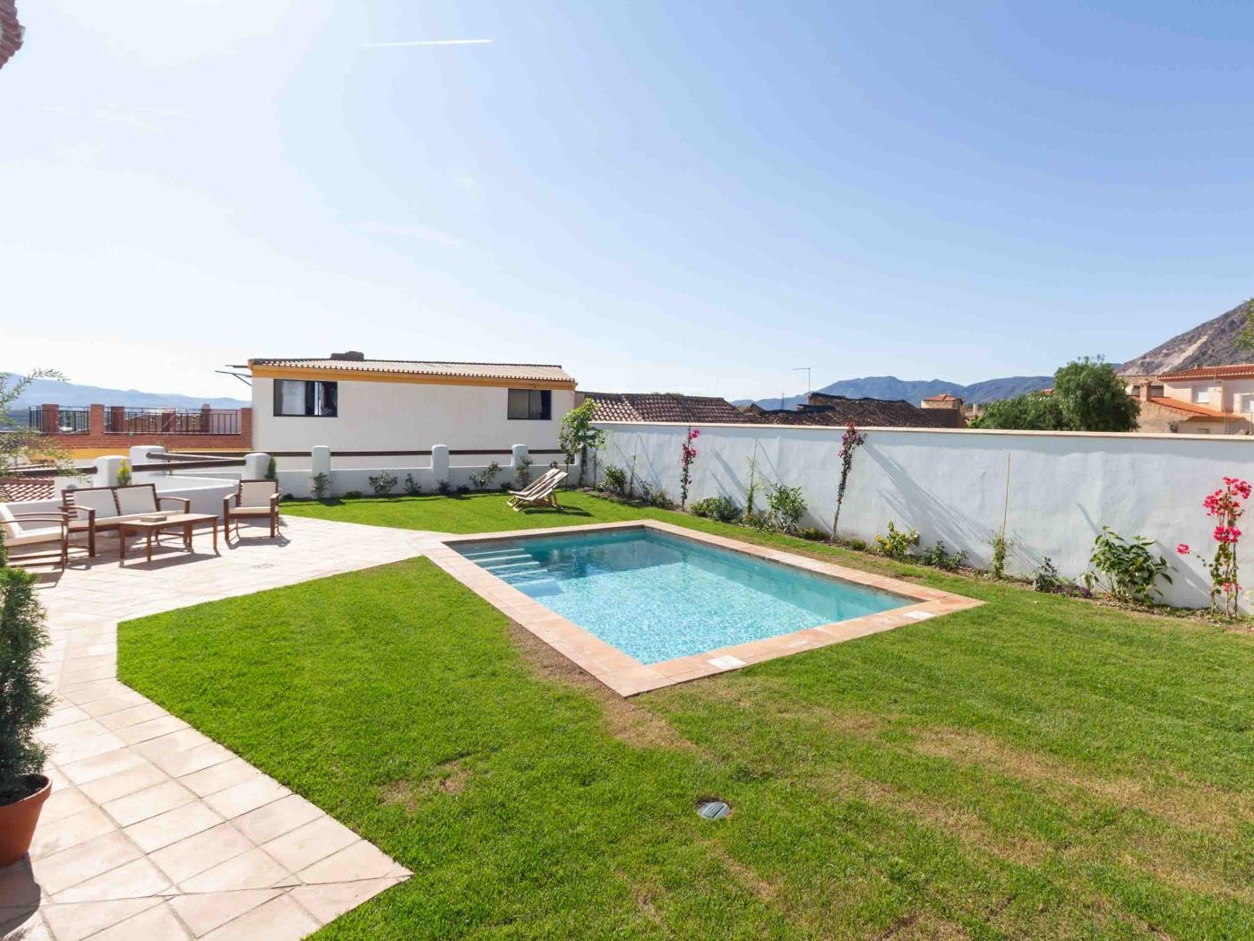 Magnificent rustic house with pool, garden, and views in Acequias