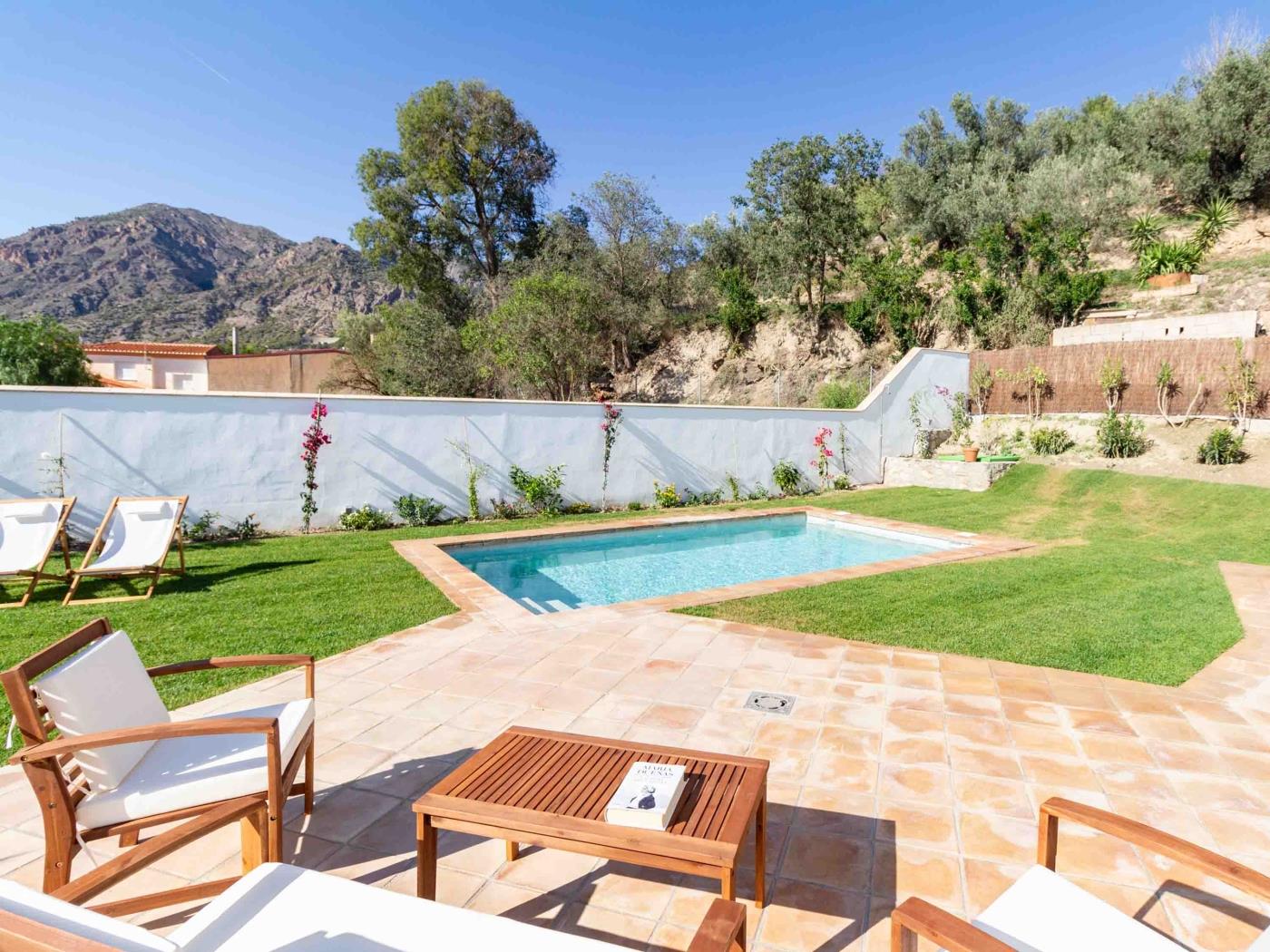 Magnificent rustic house with pool, garden, and views in Acequias