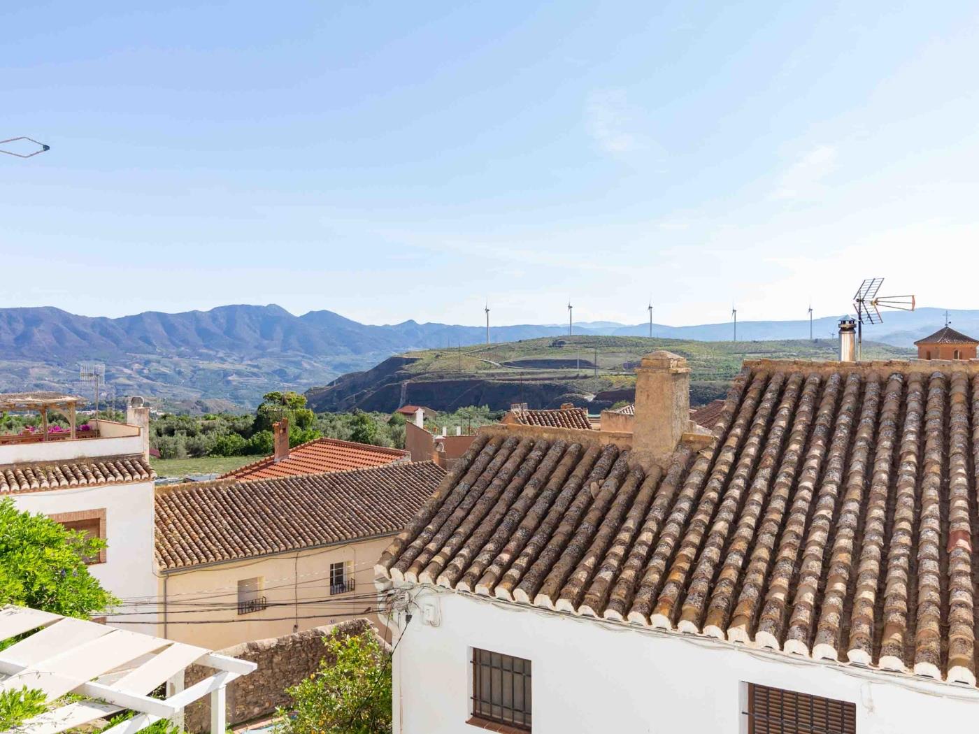 Magnificent rustic house with pool, garden, and views in Acequias
