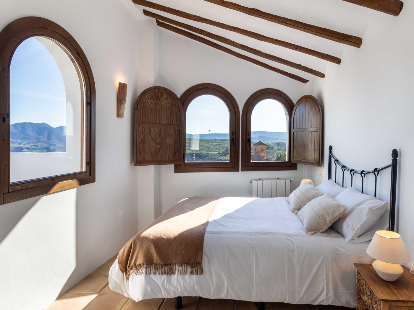 Magnificent rustic house with pool, garden, and views in Acequias