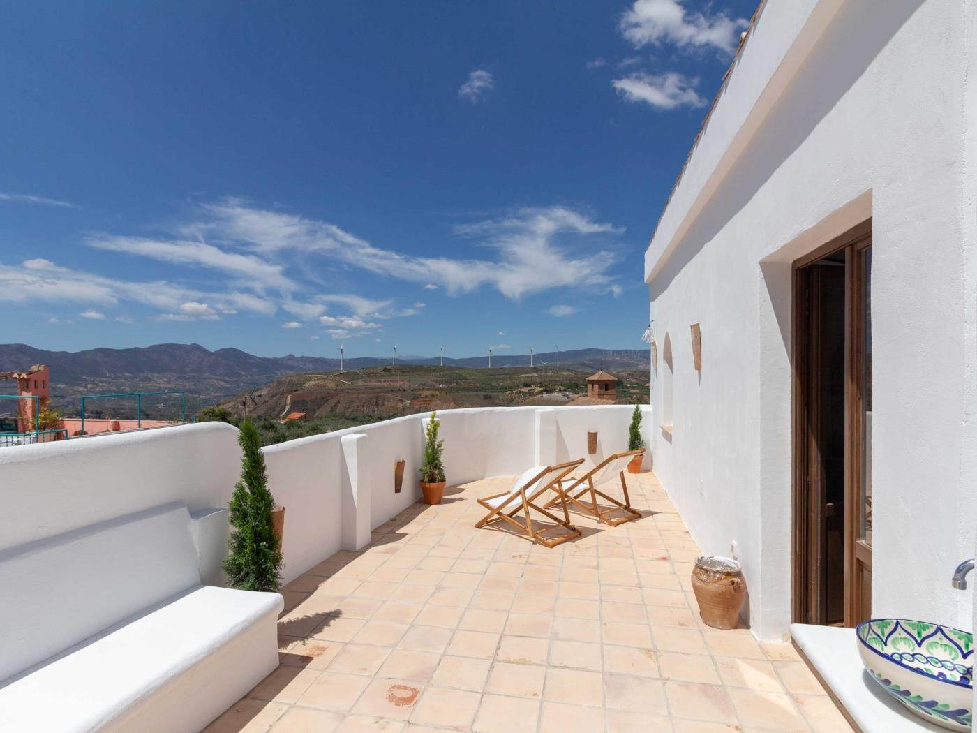 Magnificent rustic house with pool, garden, and views in Acequias