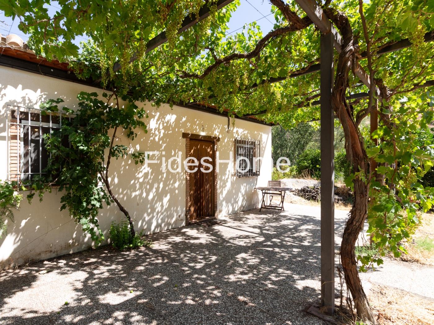A charming rustic farmhouse with extensive grounds, salt pans and fruit trees in Saleres